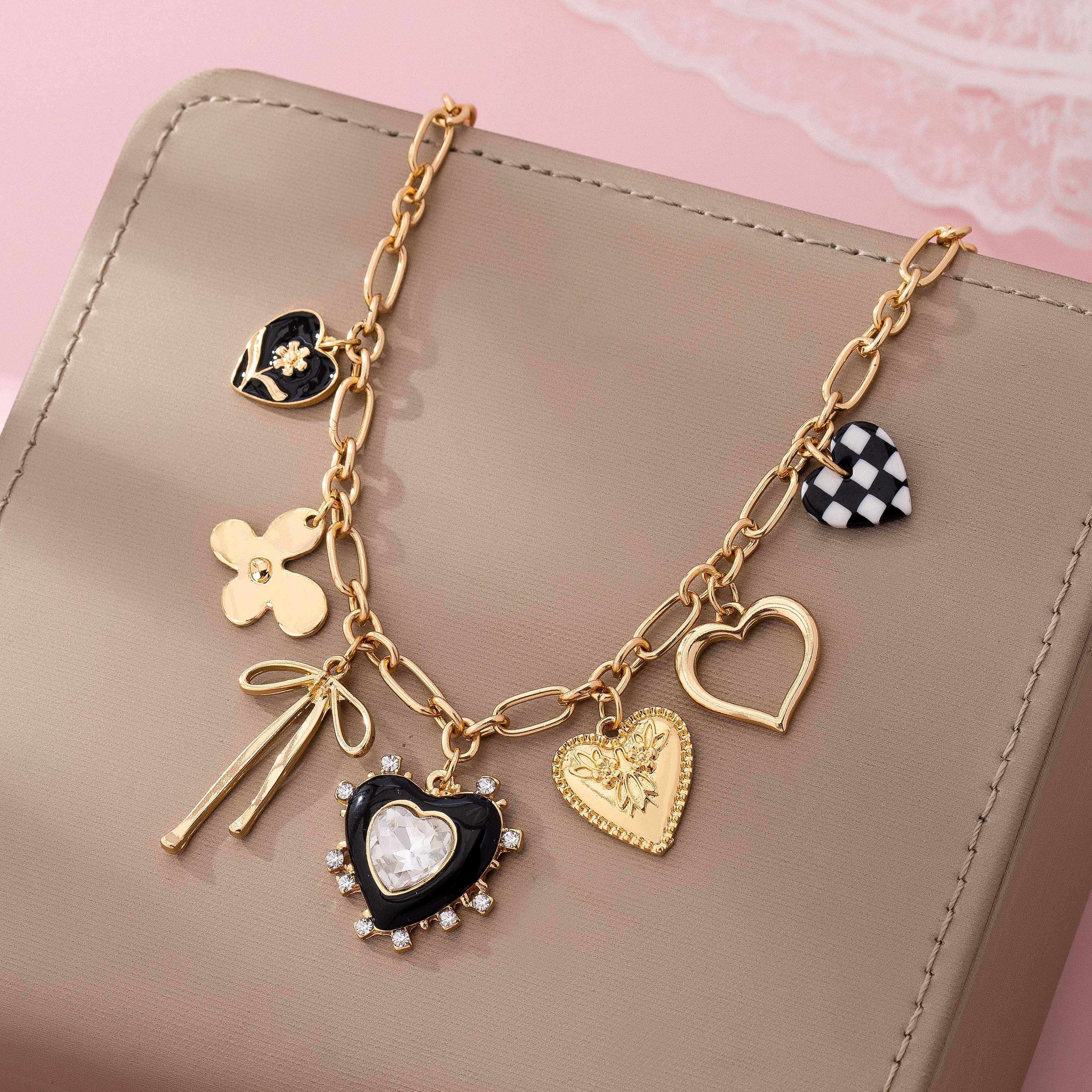 CHARM NECKLACE-BOW CHECKER HEART RHINESTONE | 80N92728