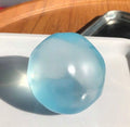 Blue or pink or clear or purple coconut oil squishy